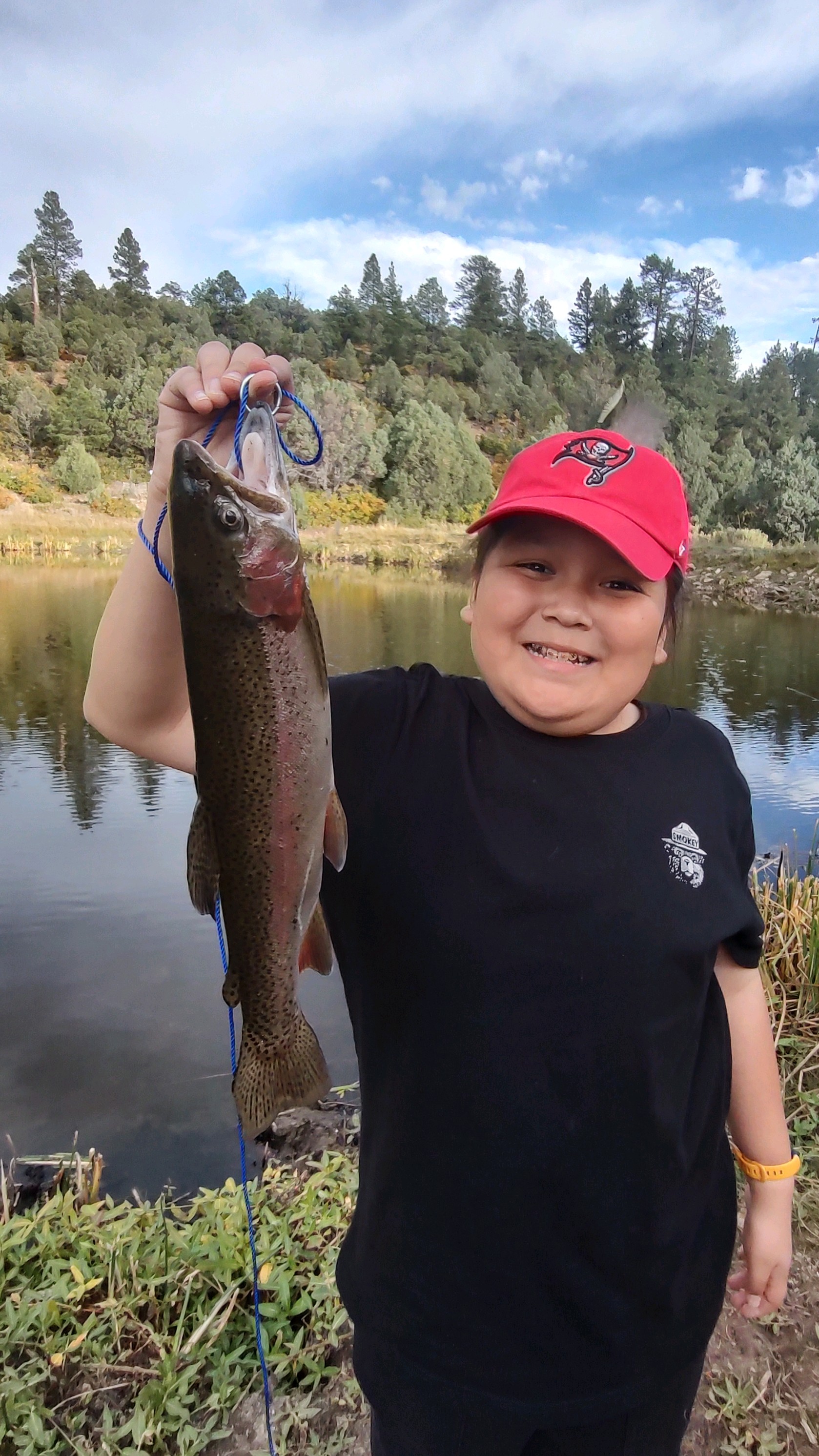 Young angler lands 10-pound lightning trout